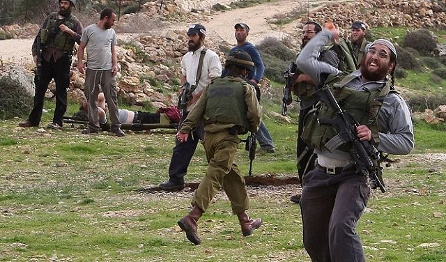 مستوطنون يهاجمون بلدات وقرى شمال وغرب رام الله بحماية الاحتلال