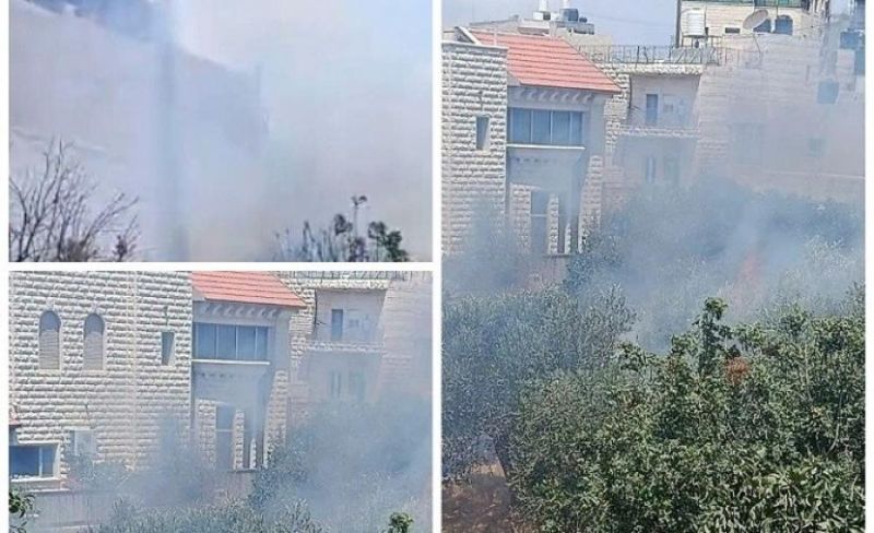 اندلاع حريق في أراضٍ ببيت عنان جراء قنابل غاز أطلقها الاحتلال