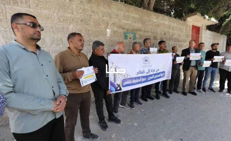 وقفة تضامنية بغزة تطالب بالإفراج الفوري عن الصحفيين الأسرى في سجون الاحتلال