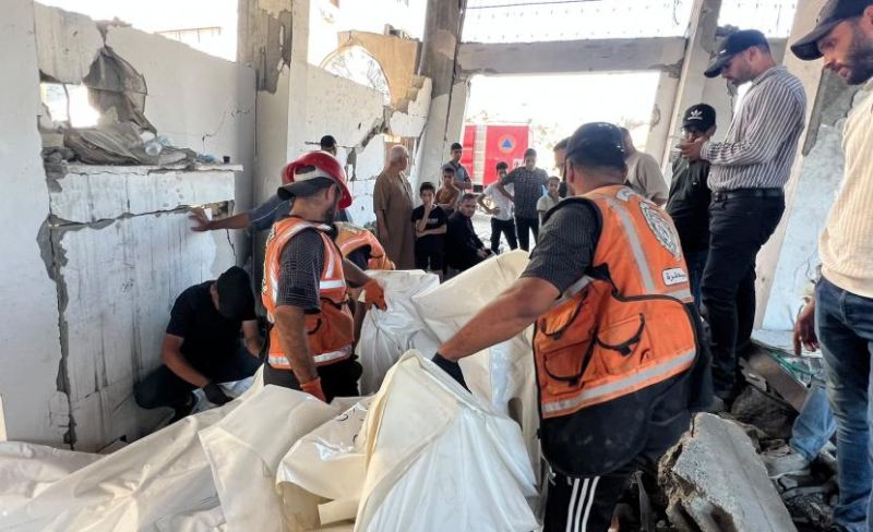 انتشال جثامين 14 شهيدًا من أسفل أنقاض عمارة "التاج" بغزة